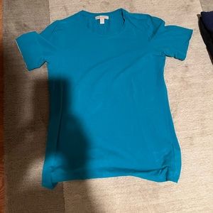 Burberry t-shirt.  Sleeve rolls up and you can see the I in iv Burberry print.